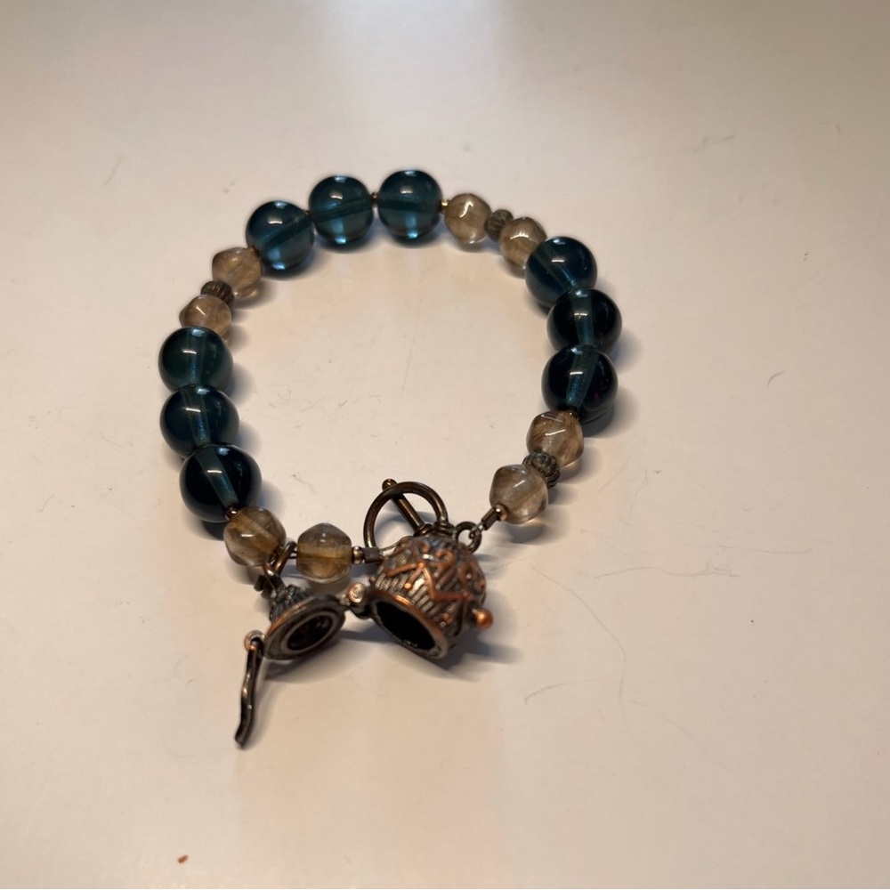 Blue & tan bracelet with locket
